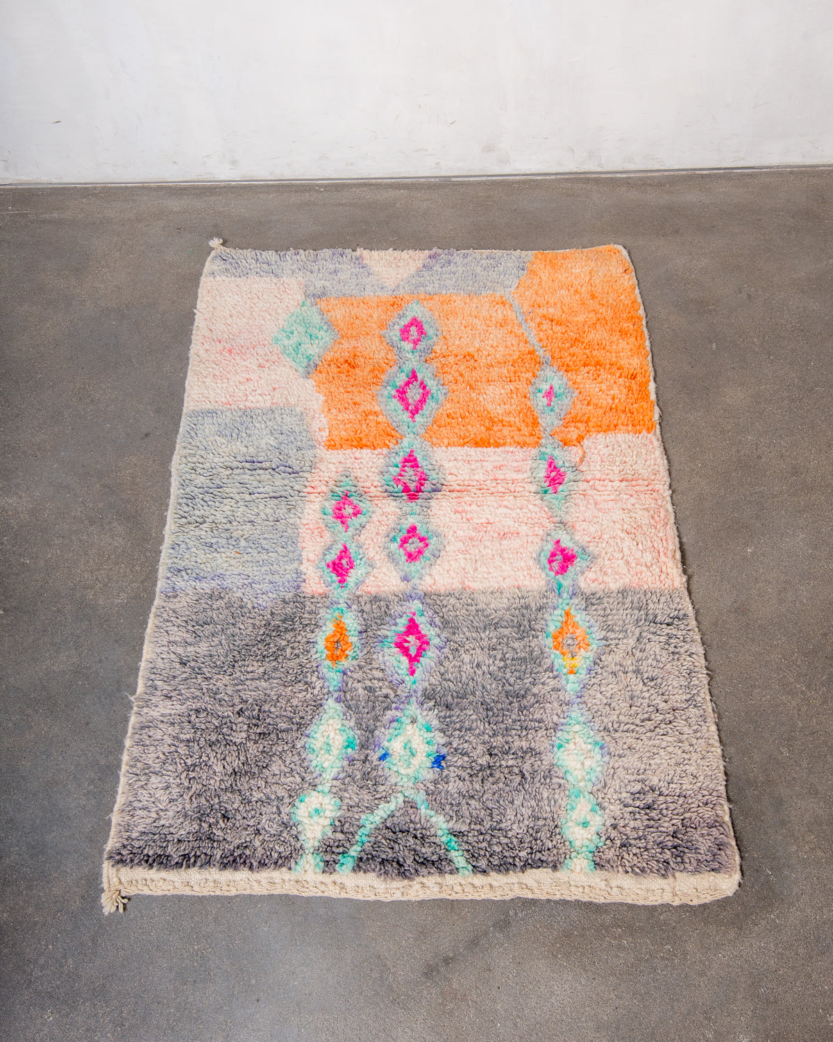 Modern, designer, handcrafted Berber rug from Morocco. Vintage carpet with beautiful colours and patterns and fluffy texture.
